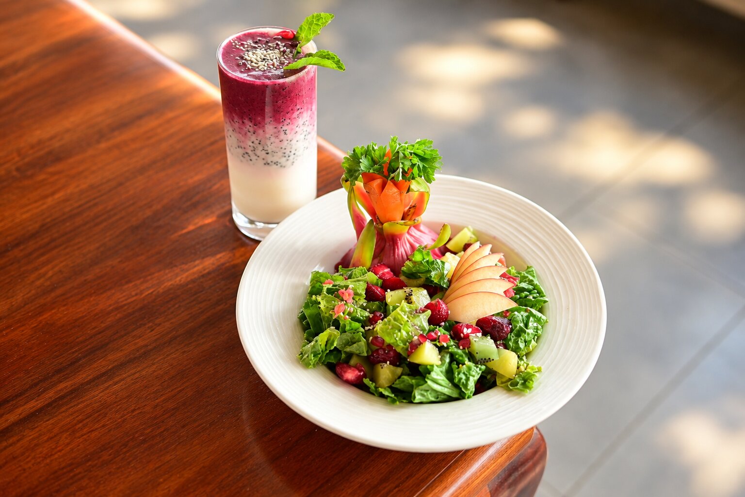 Fresh fruit salad with berry smoothie